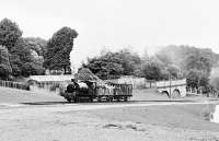 Scene on Sir William McAlpine's private railway at Fawley Hill, near Henley On Thames on 8 July 2001. The locomotive in action here is a Hudswell-Clarke 0-6-0ST named 'Sir Robert McAlpine & Sons No 81'. The ascent into the station on what is effectively a large 'garden railway' is both highly audible and enjoyable. The railway can be visited by invitation or via a club/societyparty booking. The collection of railwayana and other transport delights must be seen to be believed.<br><br>[Peter Todd 08/07/2001]