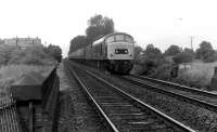 <I>Peak</I> Class 46 no 46012 drops down the Lickey incline with a passenger train heading for the south west of England in June 1980. This view looks up towards the summit at Blackwell [See image 28088].<br><br>[Mark Bartlett 21/06/1980]