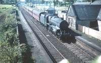 Black 5 no 45194 heads north with a train through Lochside in August 1959.<br><br>[A Snapper (Courtesy Bruce McCartney) 22/08/1959]