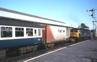 For a number of years in the 1980s a through container wagon from Aberdeen Freightliner Terminal was attached to passenger trains between Aberdeen, Inverness and a customer in Thurso. The container is seen here on its way back to Aberdeen as part of the 12.35 mixed train from Inverness on 19th September 1984.<br><br>[Frank Spaven Collection (Courtesy David Spaven) 19/09/1984]