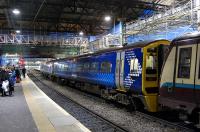 View east along platform 20 at Waverley on 12 February with a 158/170 combination standing at platform 19. The scaffolding is in connection with the Waverley Steps project, now finally underway.<br><br>[Bill Roberton 12/02/2011]