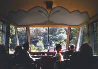 Inside the art deco style 'beaver tail' observation car on the Mallaig extension in summer 1966. This was one of two such vehicles built for a special train to mark the coronation of King George VI in 1937 and subsequently deployed on the LNER's express 'Coronation' service between London and Edinburgh.<br><br>[Frank Spaven Collection (Courtesy David Spaven) //1966]