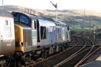 Leading locomotive of the Pathfinder Tours <I>Galloway Galloper</I> DRS 37607 heads south from Girvan on 12 February 2011 on its way to Stranraer.<br><br>[Colin Miller 12/02/2011]