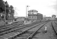 View north at Reedsmouth following closure, with the line to Riccarton Junction on the left and the Wansbeck Valley route to Morpeth on the right. The station had closed to passengers in 1956 with the signal box eventually being converted to living acomodation [see image 19664 for a similar view around half a century later]. <br><br>[Robin Barbour Collection (Courtesy Bruce McCartney) //]