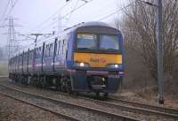 322482 nears Curriehill with the 15.14 Glasgow Central - North Berwick service on 17 February 2011.<br>
<br><br>[Bill Roberton 17/02/2011]