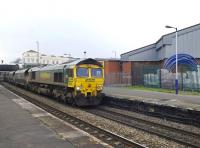 Northbound coal through Lawrence Hill, Bristol, on 17 February behind Freightliner 66550.<br><br>[Peter Todd 17/02/2011]