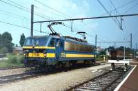 2753 of Kinkempois Depot, Liege, just arrived with a direct train from Brussels, backs down on to the stock after running round. The track in the foreground is the bay for terminating emus [see image32784] and off to the right the Vennbahn ran towards Raeren in Germany, round by Sourbrodt and Monschau, in and out of both countries,eventually crossing the Belgian border one final time at Kalterherberg. Eupen is the chief town in the German-speaking area of Belgium.<br>
<br><br>[Colin Miller /07/1989]