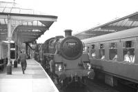 75019+75027 take on water at Skipton station on 28 July 1968 after bringing in the MRTS/SVRS <i>Farewell to BR Steam</I> railtour from Carnforth (standing at the adjacent platform). The locomotives have just been relieved by 45073+45156 who are about to take the train on to Rose Grove [see image 32782]. <br>
<br><br>[K A Gray 28/07/1986]