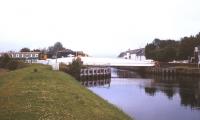 37408 <I>Loch Rannoch</I> seen shortly after the start of its journey from Inverness in the summer of 1991. The train is about to cross Clachnaharry Swing Bridge on a service to the Far North.<br><br>[Ian Dinmore /07/1991]