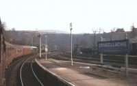 An Elgin - Aberdeen train with an NBL Type 2 in charge pulls away from Craigellachie station in August 1961.<br><br>[Frank Spaven Collection (Courtesy David Spaven) /08/1961]