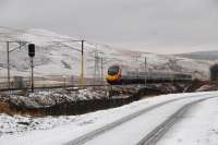 A southbound Pendolino passes Bodsbury Level Crossing.<br><br>[Ewan Crawford 15/02/2011]