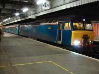 57313 stands at platform 4 at Shrewsbury station on 9 November 2010 awaiting its 18.06 departure time. The train is the Arriva Trains Wales operated, Welsh Assembly funded, limited stop return service from Cardiff to Holyhead via Crewe. <br><br>[David Pesterfield 09/11/2010]