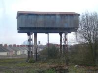 Possibly still used large capacity water tank standing between the Penarth & Barry Line and the City Line across from the north side of Cardiff Canton Depot in February 2011.<br><br>[David Pesterfield 17/02/2011]