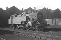 Fairburn 2-6-4T no 42210, one of Tebay's banking locomotives at that time, paying a visit to Kingmoor shed - possibly for a particular maintenance requirement - standing in the shed yard in May 1964.<br><br>[K A Gray 15/04/1964]