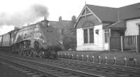 A4 Pacific no 60013 <I>Dominion of New Zealand</I> at the head of an up ECML train passing the former station at Bensham (closed 1954). <br><br>[K A Gray //]