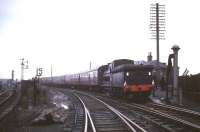 J36 no 65345 with <I>Scottish Rambler no 5</I> at Bathgate Upper on 11 April 1966, having recently brought the special back from a visit to Westfield. [See image 23043]<br><br>[Robin Barbour Collection (Courtesy Bruce McCartney) 11/04/1966]