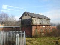 The redundant Pontypridd signal box seen from a southbound Treherbert line train in February 2011. The Merthyr and Aberdare line runs along the other side of the box.<br><br>[David Pesterfield 17/02/2011]