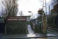 The halt at Watford North used to have very little to commend it in terms of visual charm. Sited on the Watford Junction to St Albans Abbey branch, this is the view towards the junction on January 1st 1977. It was a time when care and maintenance was minimal, the rolling stock extremely shabby and the prospects of the whole branch doubtful. The halt is still open, however, and it looks much more presentable today.<br><br>[Mark Dufton 01/01/1977]