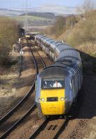 During the track renewal work at Burntisland on 27 February through services were diverted via 'the branch' (as it's known locally) through Cowdenbeath. 43310 is seen here leading the 13.10 Aberdeen - London Kings Cross 'East Coast' service past the former Lumphinnans Central Junction.<br>
<br><br>[Bill Roberton 27/02/2011]