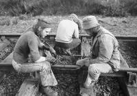 <I>What do we do now?</I> Borders rail champion Simon Longland and Railscot contributor Alasdair Taylor seem confused by a fishplate on the Strathspey Railway in 1975. None of us seems to have as much hair these days....<br>
<br>
<br><br>[Bill Roberton //1975]