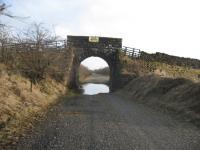 An old road over rail bridge near Cambusbeg, east of Callander, photographed in February 2011. View looks east towards Doune/Dunblane.<br><br>[Michael Gibb 12/02/2011]