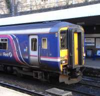 Cab of a 156 on a Glasgow Central semi-fast, seen at Platform 4 at <br>
Haymarket on 26 February. In the background is one of the bilingual <br>
name signs showing the Gaelic name 'Margadh an Fheoir'. Most of Scotland spoke a Celtic language at some time, but names which sound English, with some exceptions, were generally founded when the area was English speaking. Translating Haymarket into the Gaelic for 'Market of Hay' is interesting, but of little cultural relevance as nobody has ever called it that. Many would (and do) say it is ridiculous. I couldn't possibly comment. <br>
<br><br>[David Panton 26/02/2011]