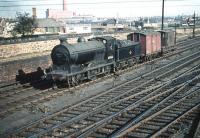 Class J37 0-6-0 no 64566 of St Margarets shed trundles past Craigentinny sidings on 30 September 1959 with a lightweight load.<br><br>[A Snapper (Courtesy Bruce McCartney) 30/09/1959]