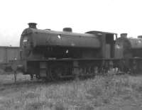 Riddles class J94 0-6-0ST no 68034 on 17C Rowsley Shed on 21 October 1962. The locomotive had arrived from Bidston (where it had worked Birkenhead Docks) in 1957 and spent the remainder of its operational life here, mainly working on the Cromford and High Peak line. <br><br>[David Pesterfield 21/10/1962]