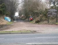 View north over the site of the level crossing linking the mineral line that ran down from Straiton sidings (now a nature reserve) to access Straiton Oil Works (now a retail park) on 21 February 2011. (McDonalds stands immediately behind the camera.) [see image 32985]. <br><br>[John Furnevel 21/02/2011]