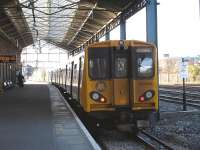 Merseyrail EMU 507010 stands at Platform 7b of Chester Station on 2 March awaiting its 15.46 departure time to return to Liverpool Central via Hooton.<br><br>[David Pesterfield 02/03/2011]