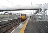 The 08.11 service to Edinburgh Waverley (06.40 ex-Helensburgh Central) calls at Armadale on 4 March 2011. This was the first day of scheduled passenger services at the new station.<br>
<br><br>[John Yellowlees 04/03/2011]