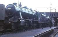 Nicely bulled up for its last weekend of steam duties is Stanier LMS 8F 2-8-0 48476, photographed at Lostock Hall shed on 2nd August 1968. Two days later it piloted BR Standard 5MT 4-6-0 73069 from Manchester Victoria to Blackburn via Oldham, Rochdale, Bury Knowsley St and Bolton on the RCTS <I>End of Steam Commemorative Rail Tour</I>. Despite appearances the 8F then unfortunately had a one-way ticket to the breakers yard. [See image 31774]<br><br>[David Hindle 02/08/1968]