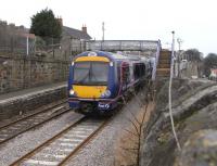 170 458 leaving Kinghorn on 5 March with a service to, unusually, Dunfermline Town due to a diversion caused by weekend engineering works. At least passengers on Platform 1 would have been aware in advance where this train was heading: a Customer Information Screen has just been installed there, 4 years after one was installed on Platform 2. NR and FSR waiting on each other, apparently: though that was in 2008! <br><br>[David Panton 05/03/2011]