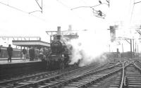The MRTC <I>Three Counties Special</I> stands at Stockport on 26 November 1966 behind Ivatt 2-6-2T no 41204. The locomotive had just taken over from 47202+47383 which had hauled the train from Bury Bolton Street [see image 34475] and was preparing to set off on the next leg of the tour to Buxton.<br><br>[K A Gray 26/11/1966]