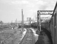 What is thought to be the BR (LMR) 'Midland Line Centenary Special'  of 9 June 1968 approaching Ashburys station behind Britannia Pacific no 70013 <I>Oliver Cromwell</I>. <br><br>[K A Gray 09/06/1968]