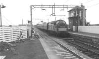 The 16.56 SX Glasgow Central - Gourock service arriving at Bishopton in September 1966. Note the ex-Caledonian signal box, then still in operation.<br><br>[Colin Miller /09/1966]