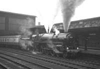 Boxing Day 1967 in Carlisle... and what better way to help shake off those Christmas excesses than to head off to a football match -  in this case a Football League Division 2 clash away to Blackpool. Britannia Pacific no 70013 <I>Oliver Cromwell</I> prepares to take out the Carlisle United football special packed with fans who would help to make up the crowd of 20,000+ at Bloomfield Road that day who witnessed an entertaining 1-1 draw.<br>
<br><br>[K A Gray 26/12/1967]