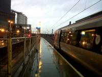 A Voyager for Glasgow Central encounters a little Cheshire mist at Warrington Bank Quay on its way North on 5 February. The driver had popped out with a green flag, but then had very sensibly retreated back into the train.<br><br>[Ken Strachan 05/02/2011]