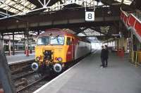 Having dragged a Pendolino set off the North Wales line into <br>
Platform 11 at Crewe with a London bound service, 57304 <I>Gordon Tracy</I> now stands in the Platform 8 bay on 12 March, where it is being admired by two young enthusiasts.<br>
<br><br>[John McIntyre 12/03/2011]