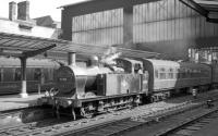 Fowler 3F 0-6-0T no 47345 on station pilot duty at the north end of Carlisle, thought to have been taken in March 1964. The locomotive was withdrawn six months later.<br><br>[Robin Barbour Collection (Courtesy Bruce McCartney) 26/03/1964]