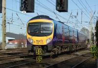 An arrival from Manchester Airport about to run into Preston station on 14 March 2011. The train will divide here, with the front unit going on to Blackpool and the rear heading for Windermere.<br>
<br><br>[John McIntyre 14/03/2011]