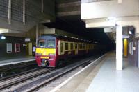 An eastbound train about to plunge back into the gloom at Charing Cross in July 2010.<br><br>[Colin Miller 08/07/2010]