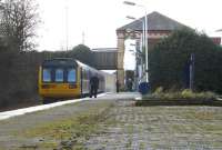 Double Donkeys call at Kirkham & Wesham on their way west to <br>
Blackpool North (a few hundred yards from the beach!) on 9 March 2011. Unit 142007 is on the front and 142028 on the rear, the destination board on the latter still showing Manchester Victoria. <br>
<br><br>[John McIntyre 09/03/2011]