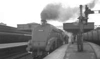 Final exchanges with the train crew at Aberdeen in early 1966 as A4 Pacific no 60024 <I>Kingfisher</I> prepares to depart with the 1.30pm for Glasgow Buchanan Street.<br><br>[K A Gray //1966]