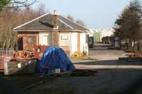 The converted goods yard at Loanhead on 28 February 2001 now in use as a council depot/store. Note the surviving buffer stops below the trees on the right. View north with the old station behind the camera. <br><br>[John Furnevel 28/02/2011]