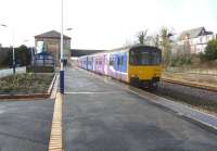 Arriving at Kirkham & Wesham is 150150 on its way from Blackpool North to Manchester Victoria on 9 March 2011. The station building is receiving some refurbishment at present and temporary steps (under the white sheeting) have been installed while work is carried out on the normal stairway leading from the ticket office. The tracks on the right are the fast lines that bypass the station.<br>
<br><br>[John McIntyre 09/03/2011]