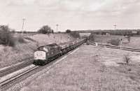 37131 running into Westbury through Heywood Road Junction from the Bath direction in February 1990 with a loaded coal train.<br><br>[Peter Todd 21/02/1990]