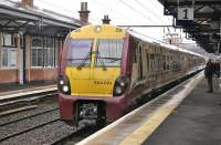 334 001 on the 12.40 Helensburgh Central - Edinburgh Waverley calls at Dumbarton Central on 15 March.<br>
<br><br>[Bill Roberton 15/03/2011]