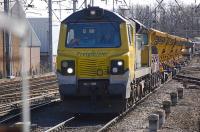 Freightliner 70006 approaches Carlisle Station from the south with a departmental train on 18 March.<br><br>[Bill Roberton 18/03/2011]