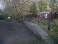 This halt in Wiltshire was built for Lord Lansdowne, to serve Bowood House and estate. The platform once extended past the fluorescent chap on his bike. I would love to say that the 'lost pet' notice taped to the nameboard was for a black dog, but it was for a formerly caged bird.<br><br>[Ken Strachan 26/02/2011]